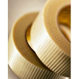 An image of a reinforced tape from Macfarlane Packaging. Our reinforced paper tape is both extremely strong and versatile. Explore our full range of filament tapes.