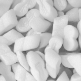 An image of packing peanuts from Macfarlane Packaging. Explore our full range of packing chips to help fill any spaces in cardboard boxes after the item has been packed so that it can protect your goods in transit.
